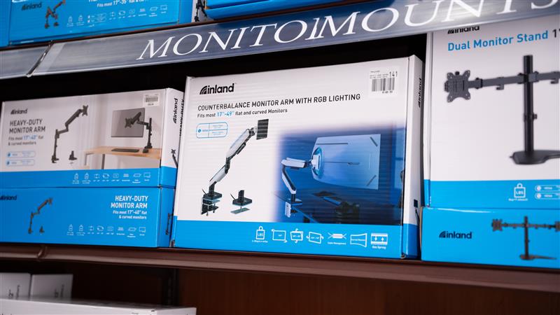 Inland monitor arm on shelf